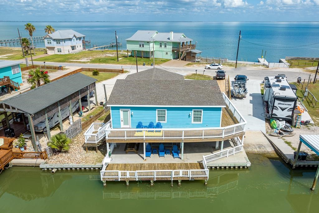 an aerial view of a house with swimming pool