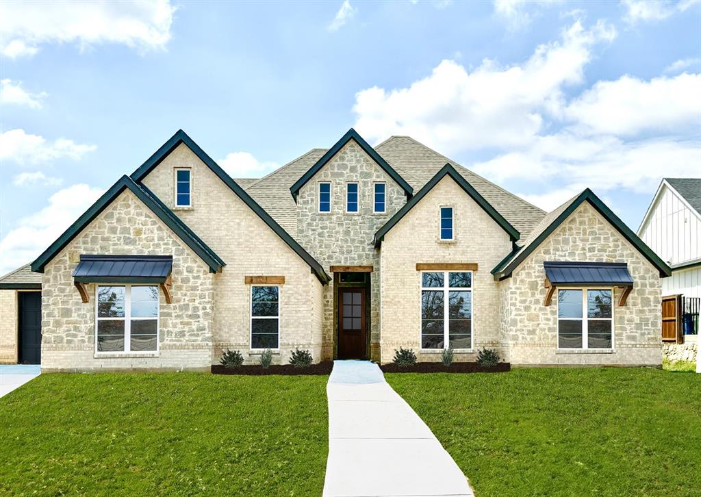 front view of a house and a yard