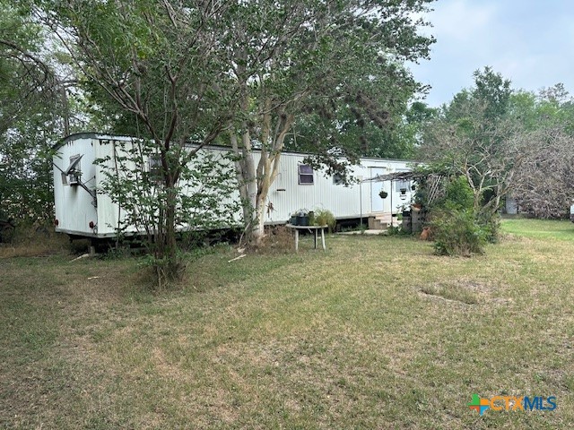 a view of outdoor space and yard