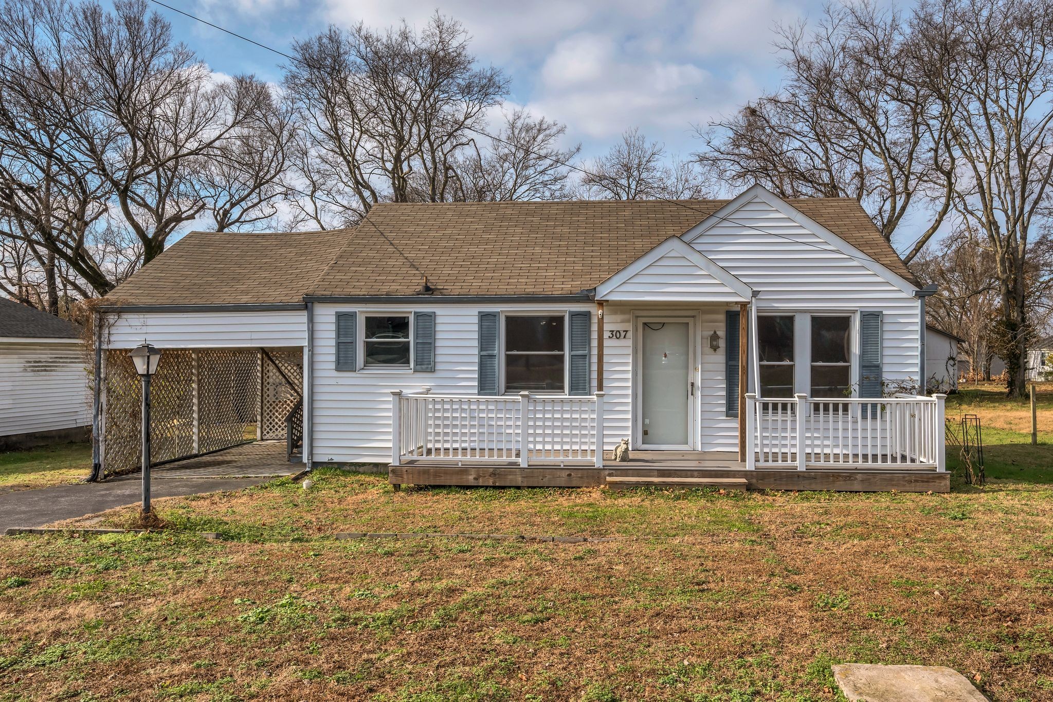 front view of a house with a yard