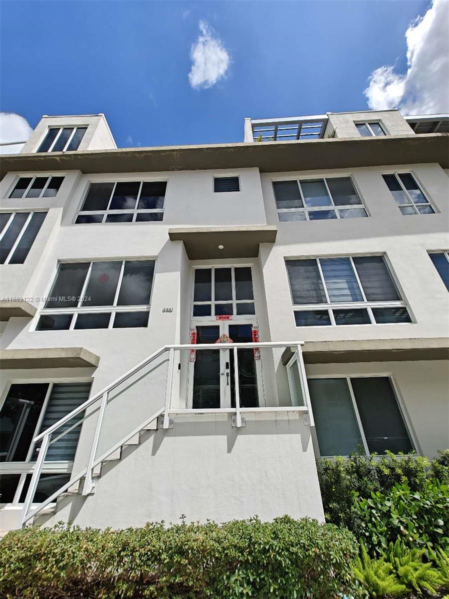 a view of a large white building