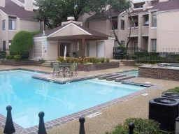 a front view of a house with swimming pool