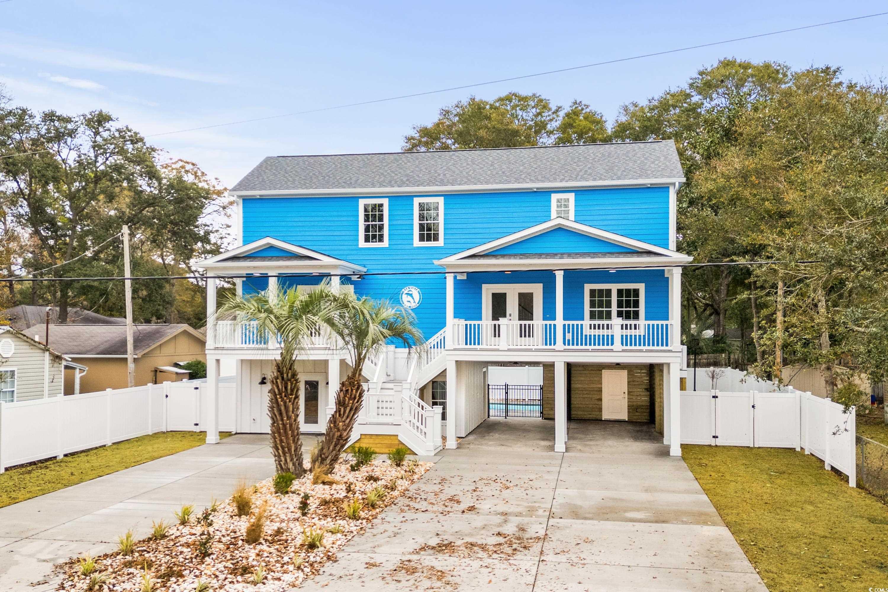 View of front facade featuring covered porch and a