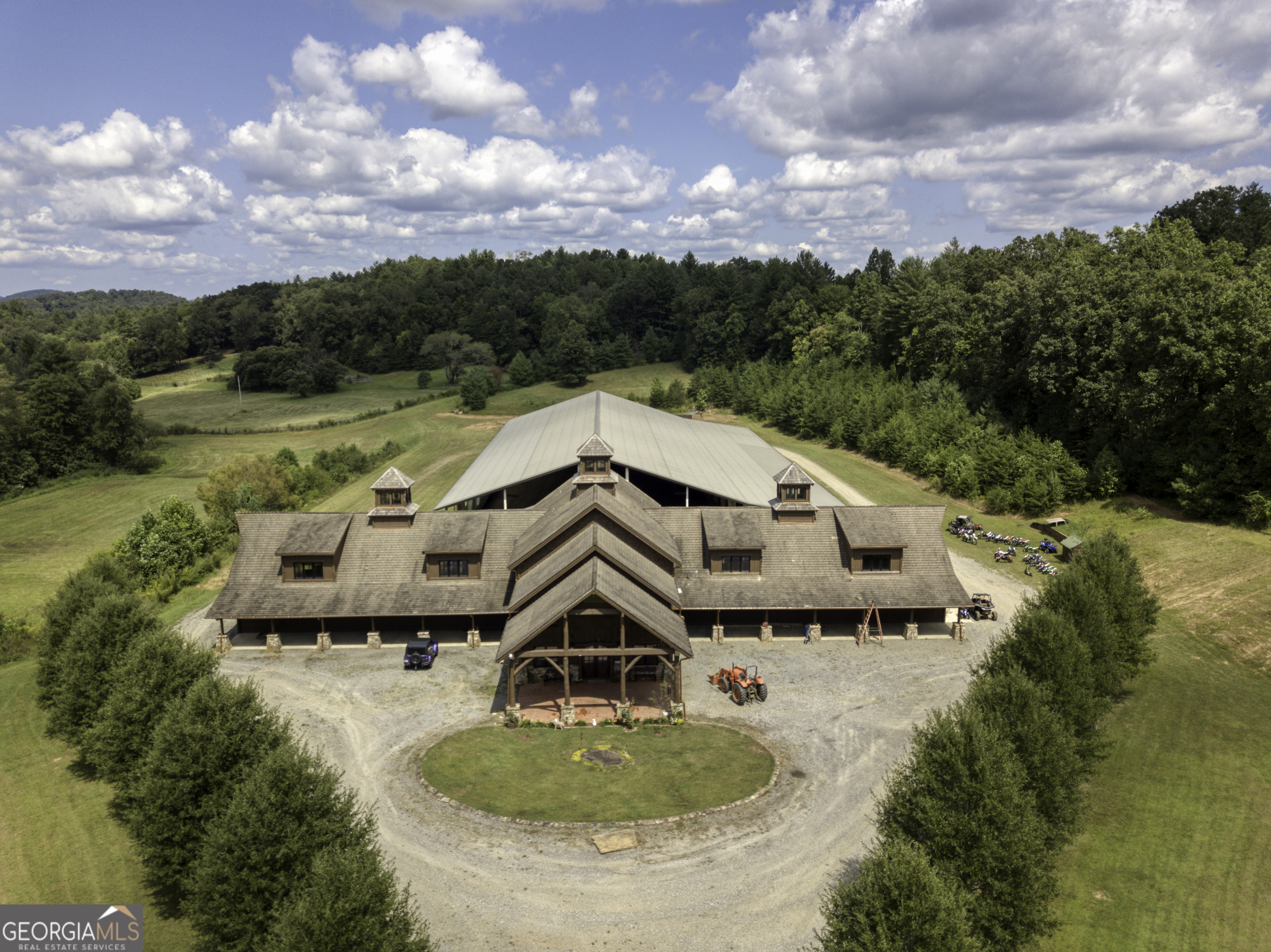 an aerial view of a house with outdoor space