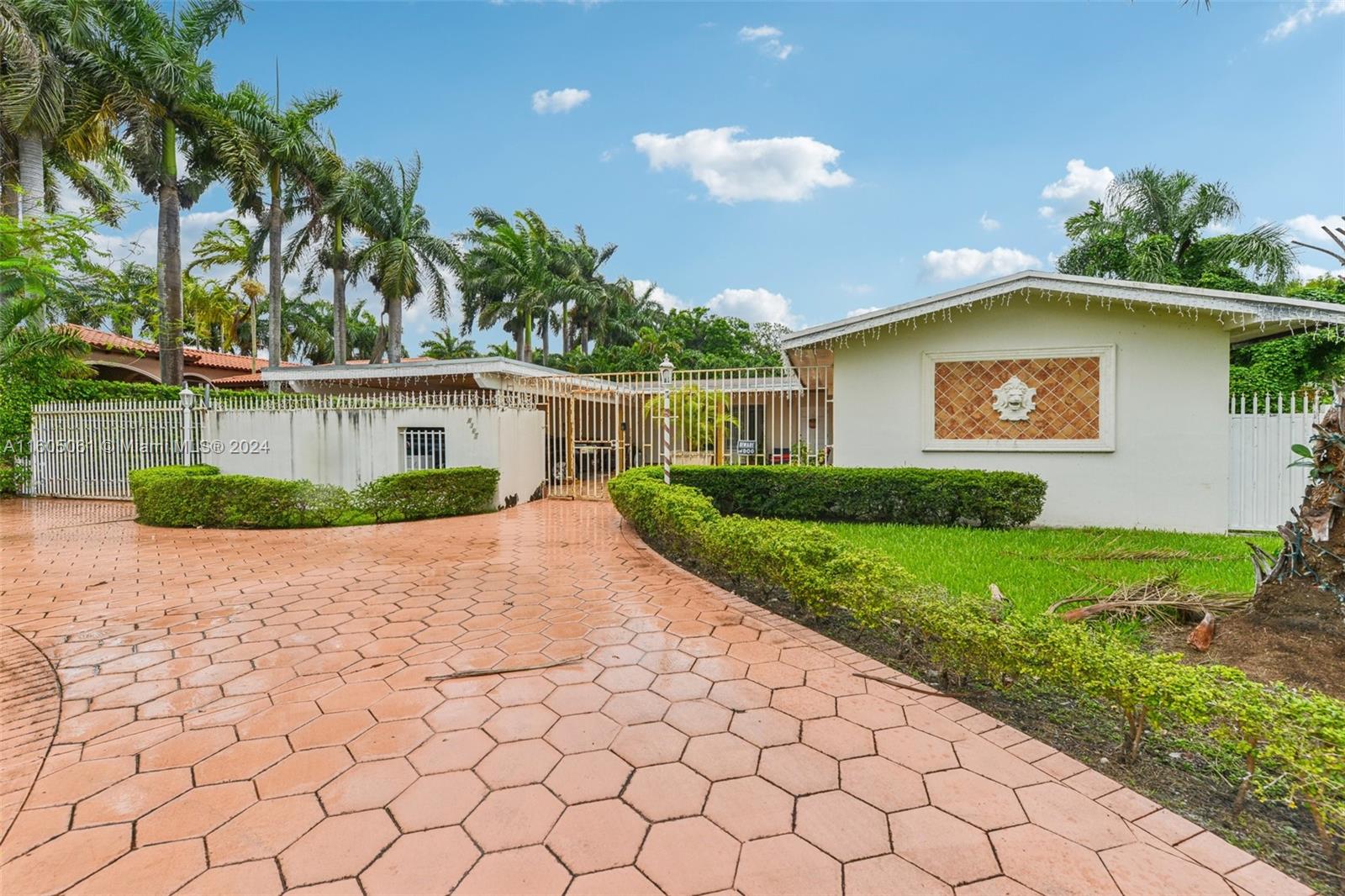 a house with garden in front of it