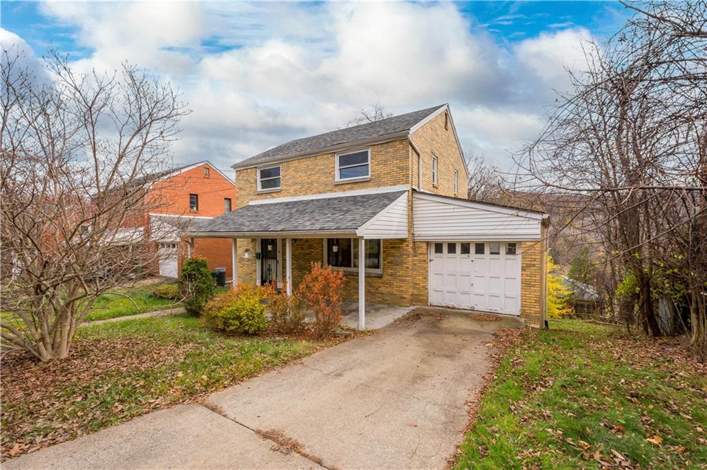 front view of house with a yard