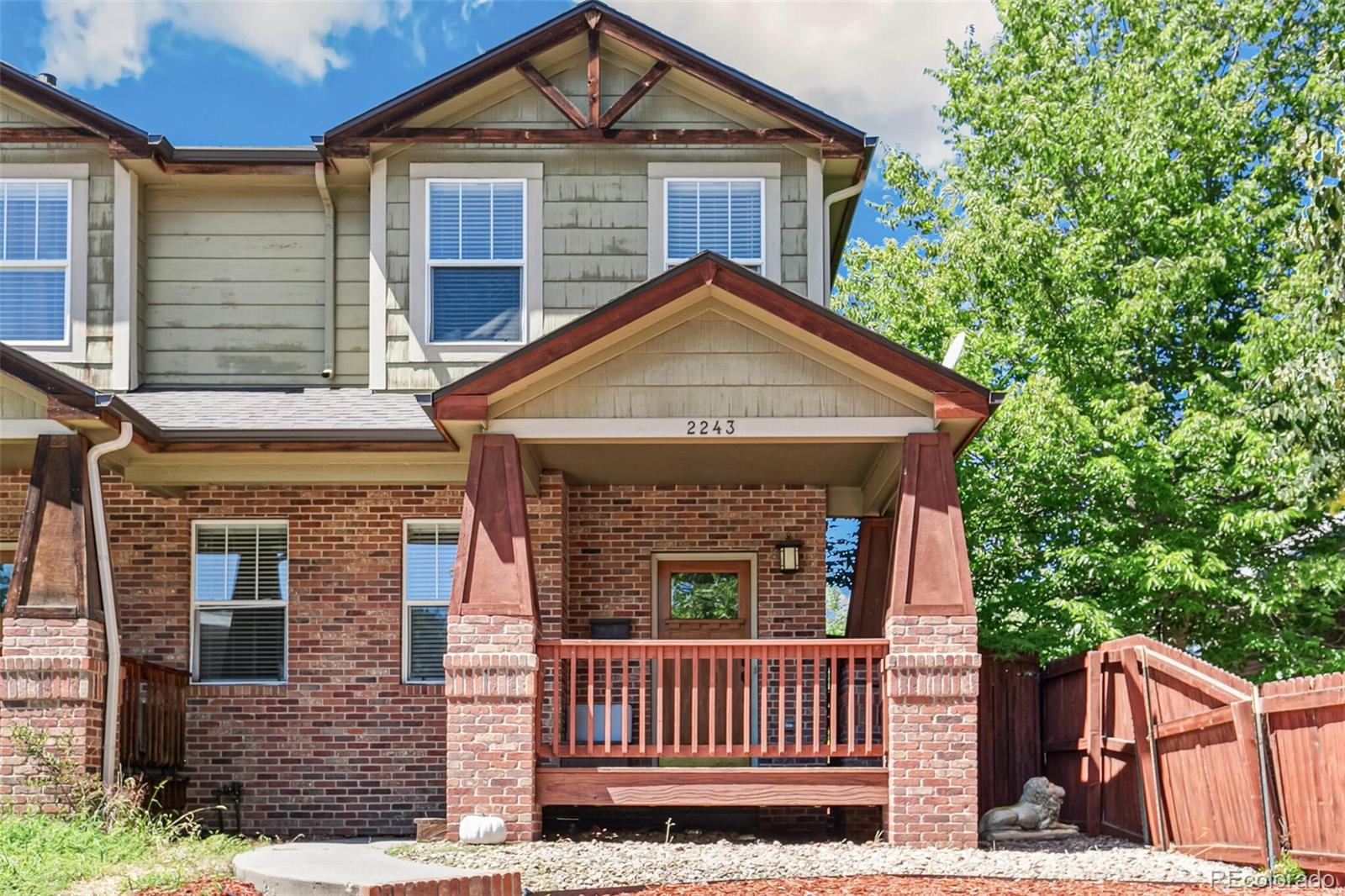 a front view of a house with garage