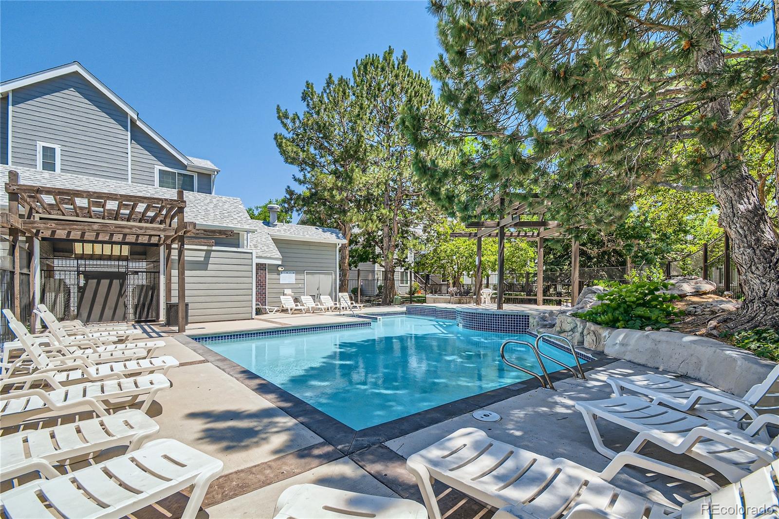 a view of a backyard with a patio