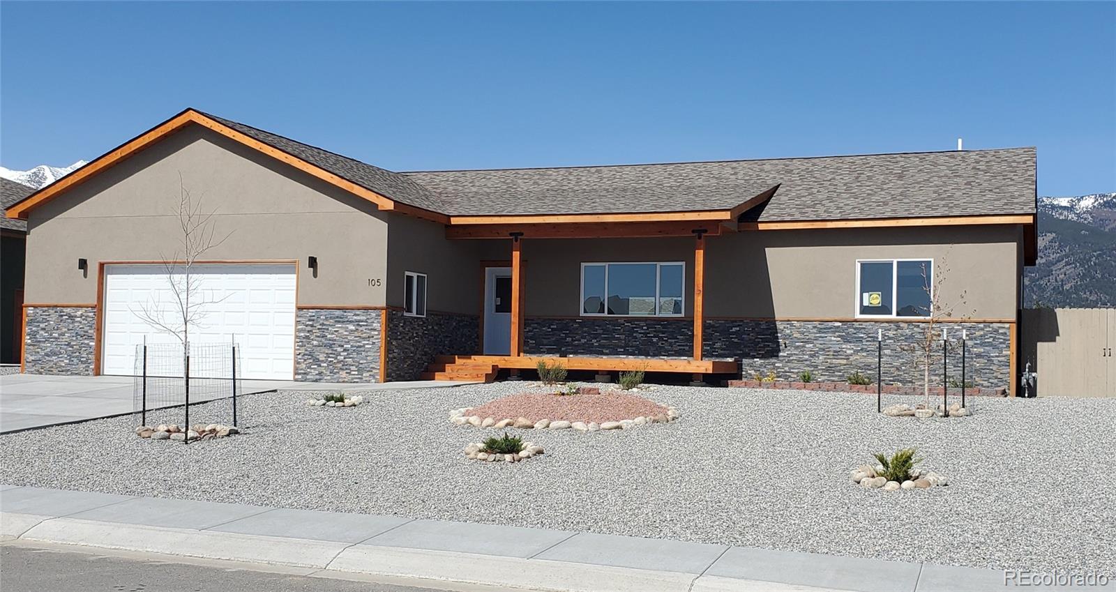 an outdoor view of house with outdoor seating