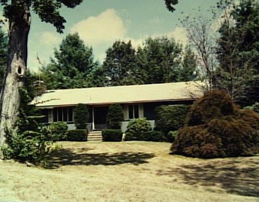 a view of a house with swimming pool