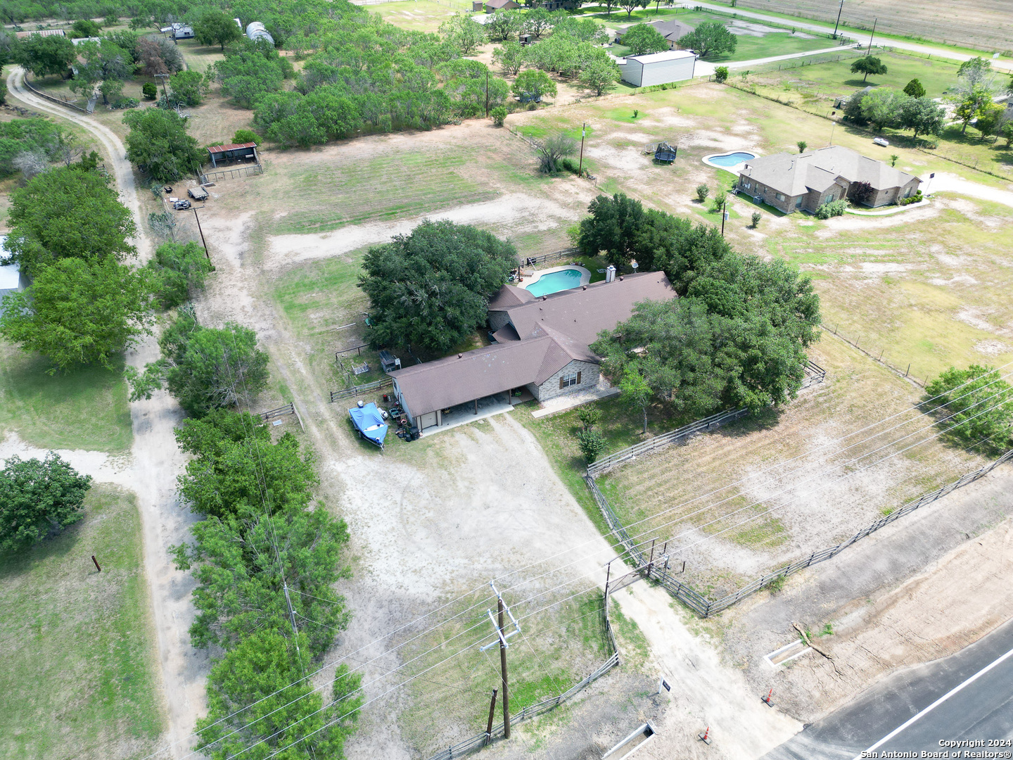 an aerial view of residential house with outdoor space
