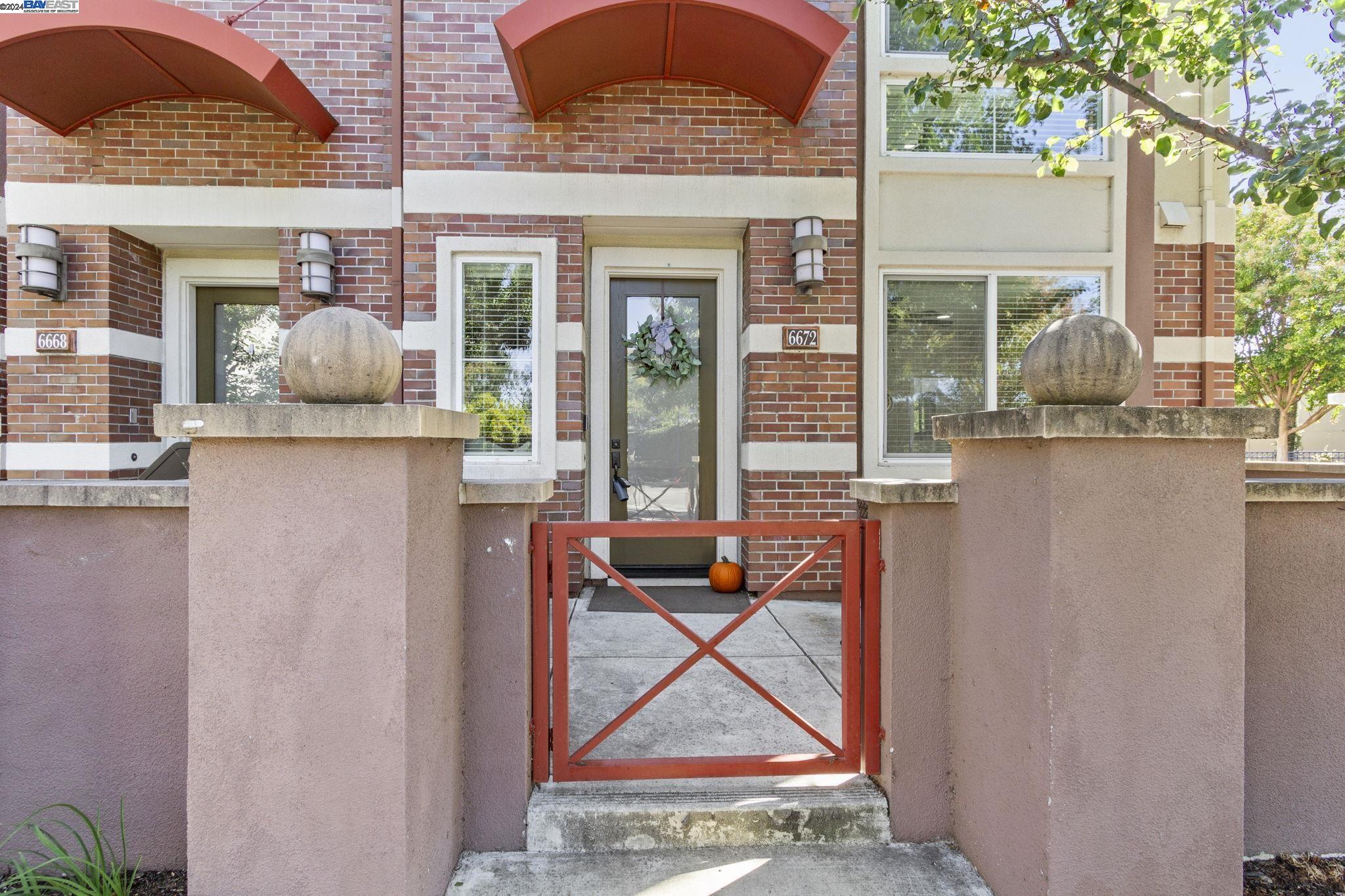 a view of front door of house and entrance