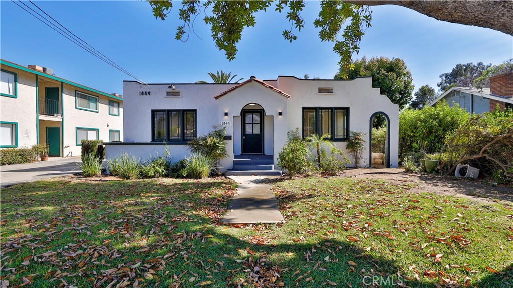 front view of a house with a yard