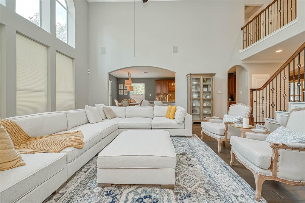 a living room with furniture and a rug