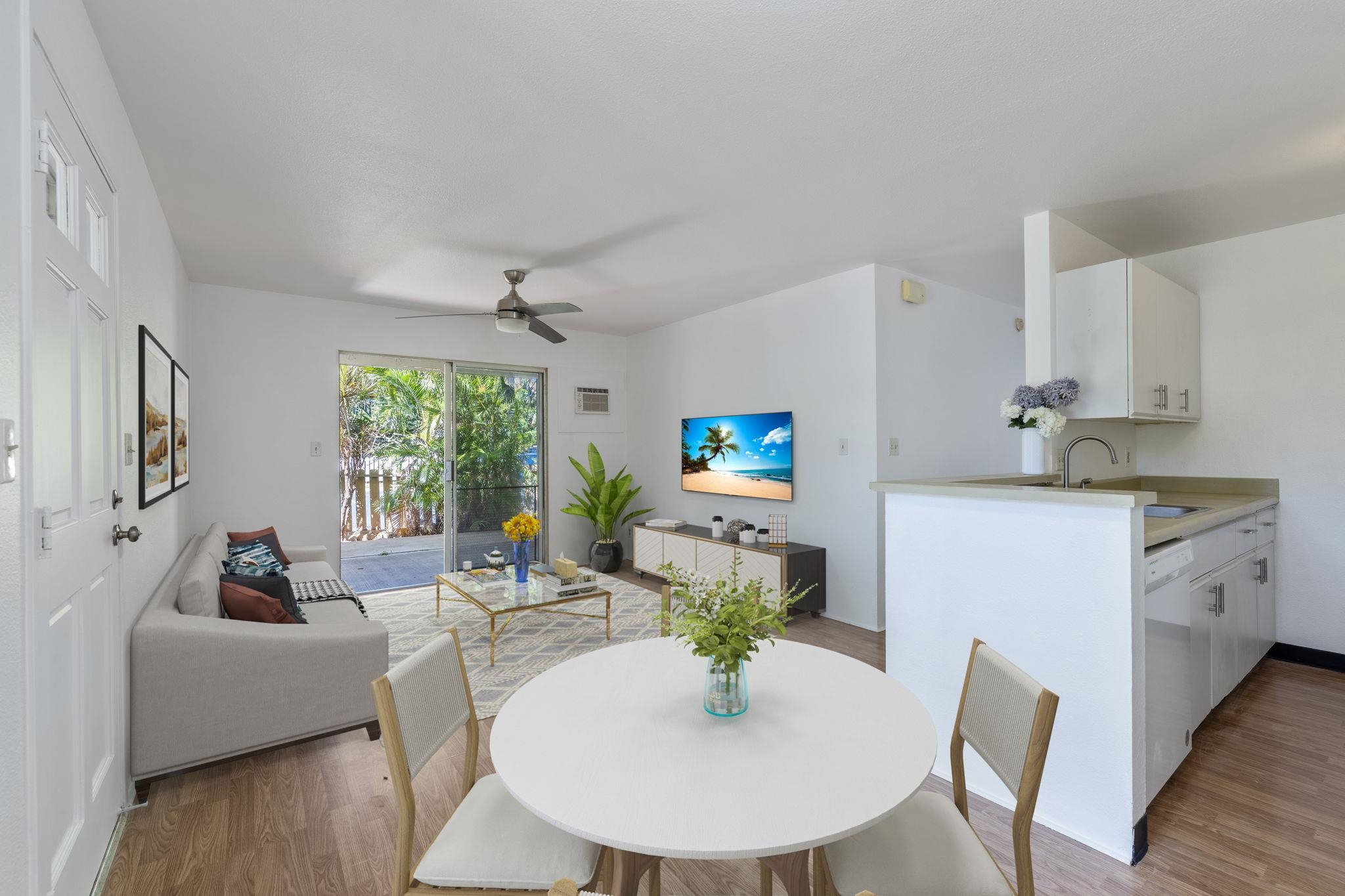 a living room with furniture and a flat screen tv