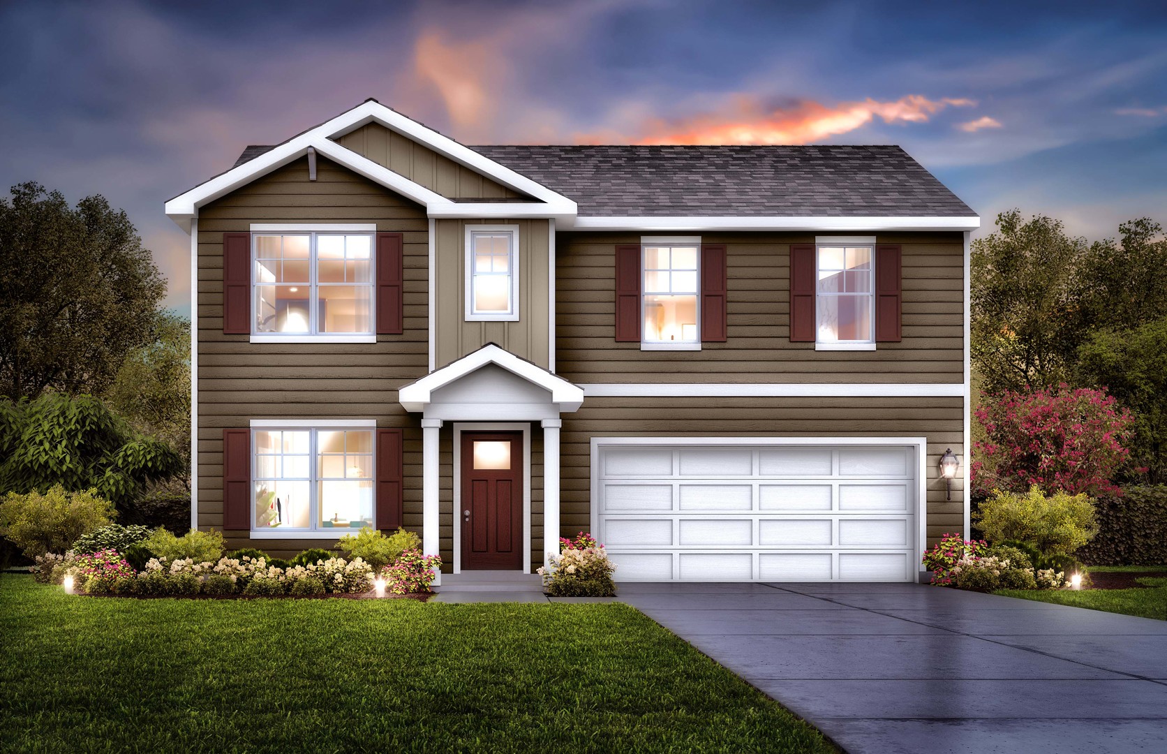 a front view of a house with a yard and garage