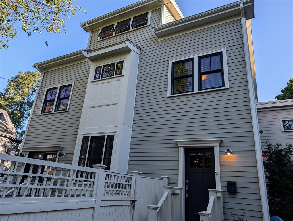 a view of a house with a door and a porch