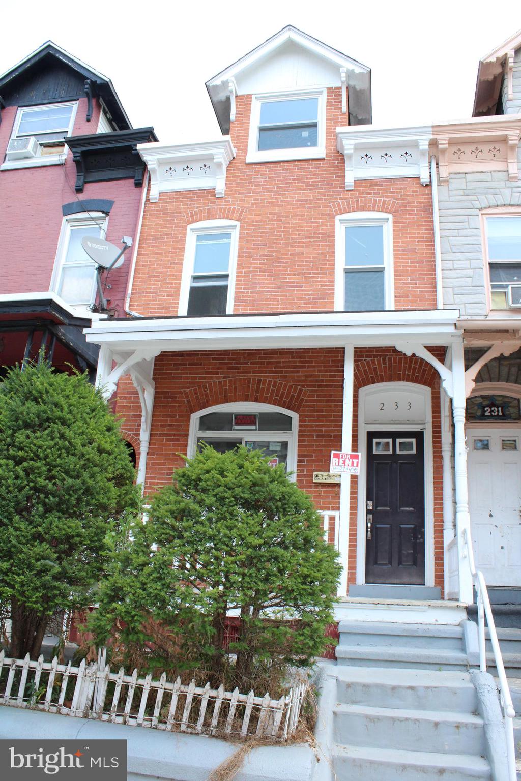 a front view of a multi story residential apartment building