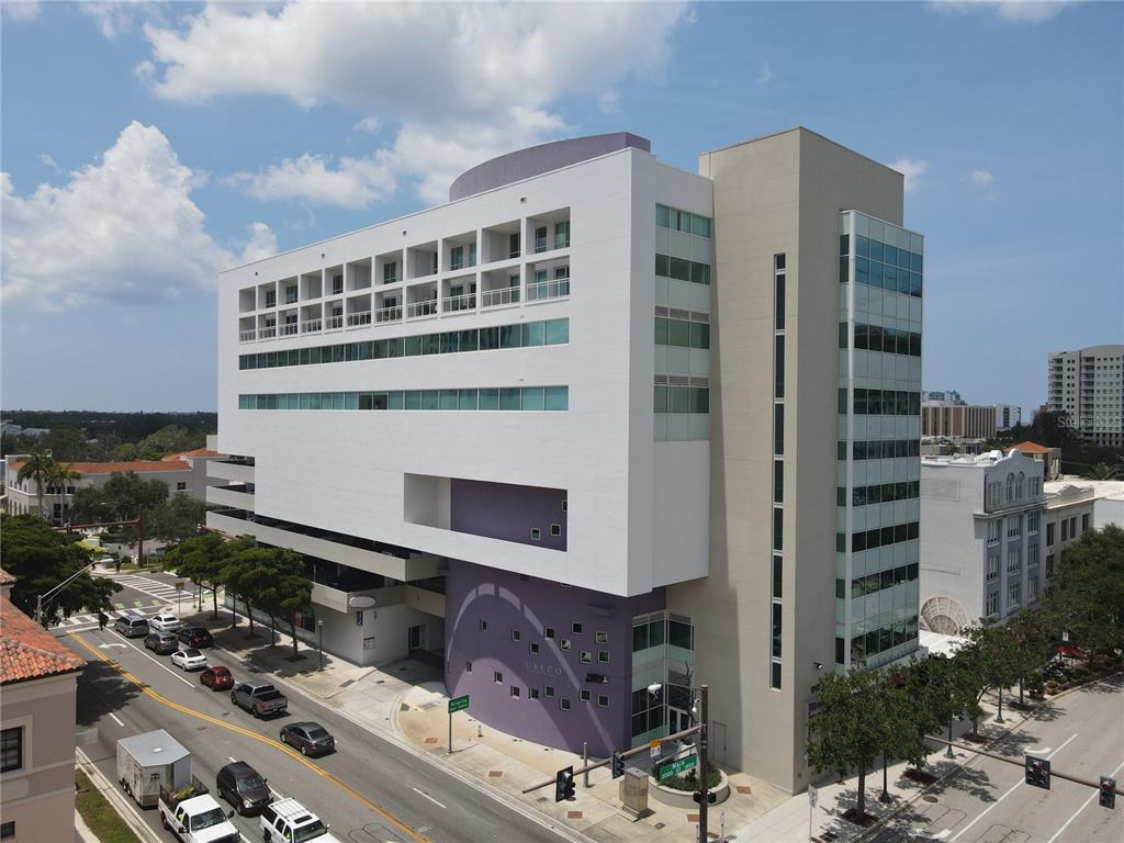 a front view of a building with glass windows