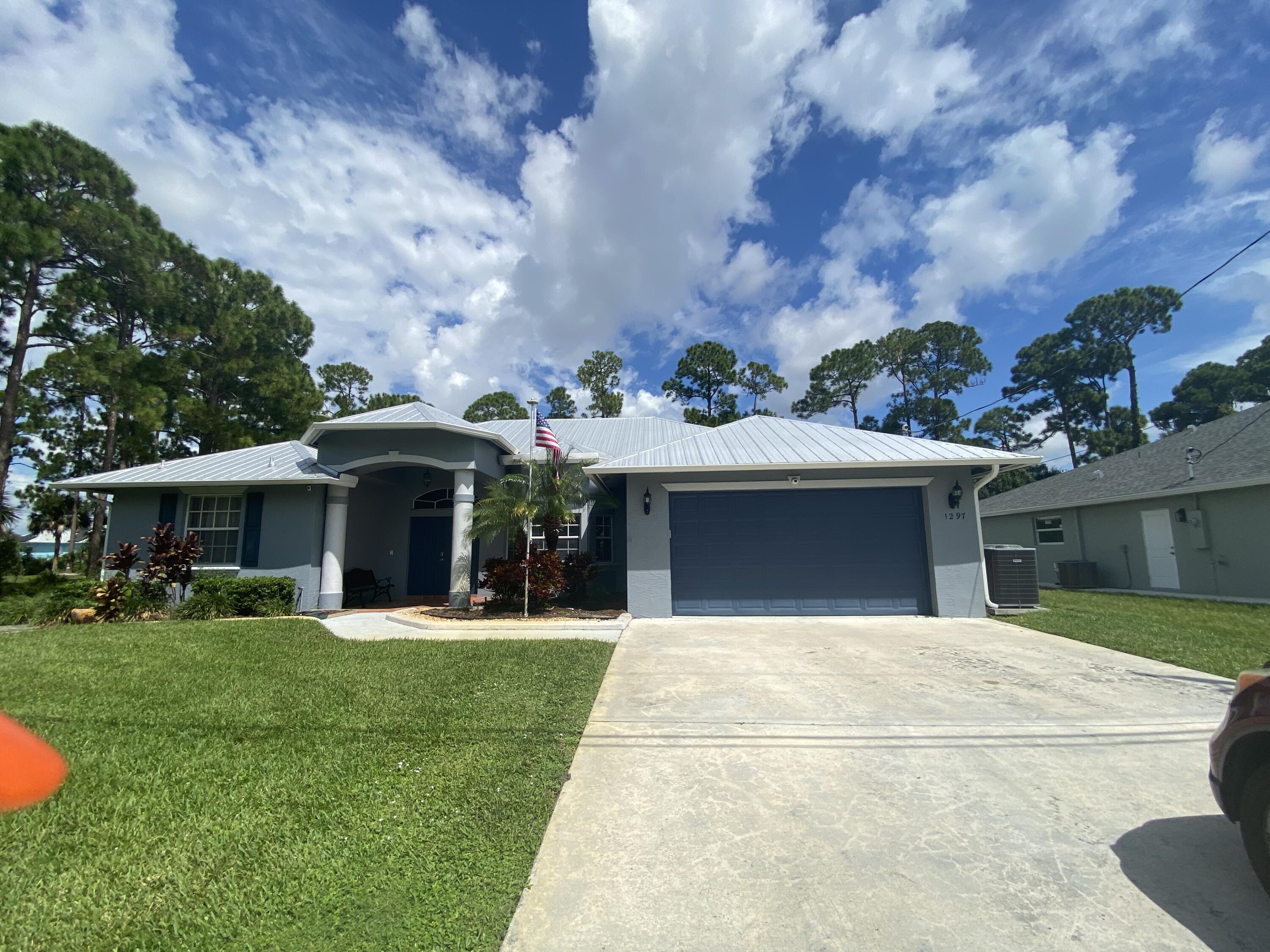 a front view of house with yard