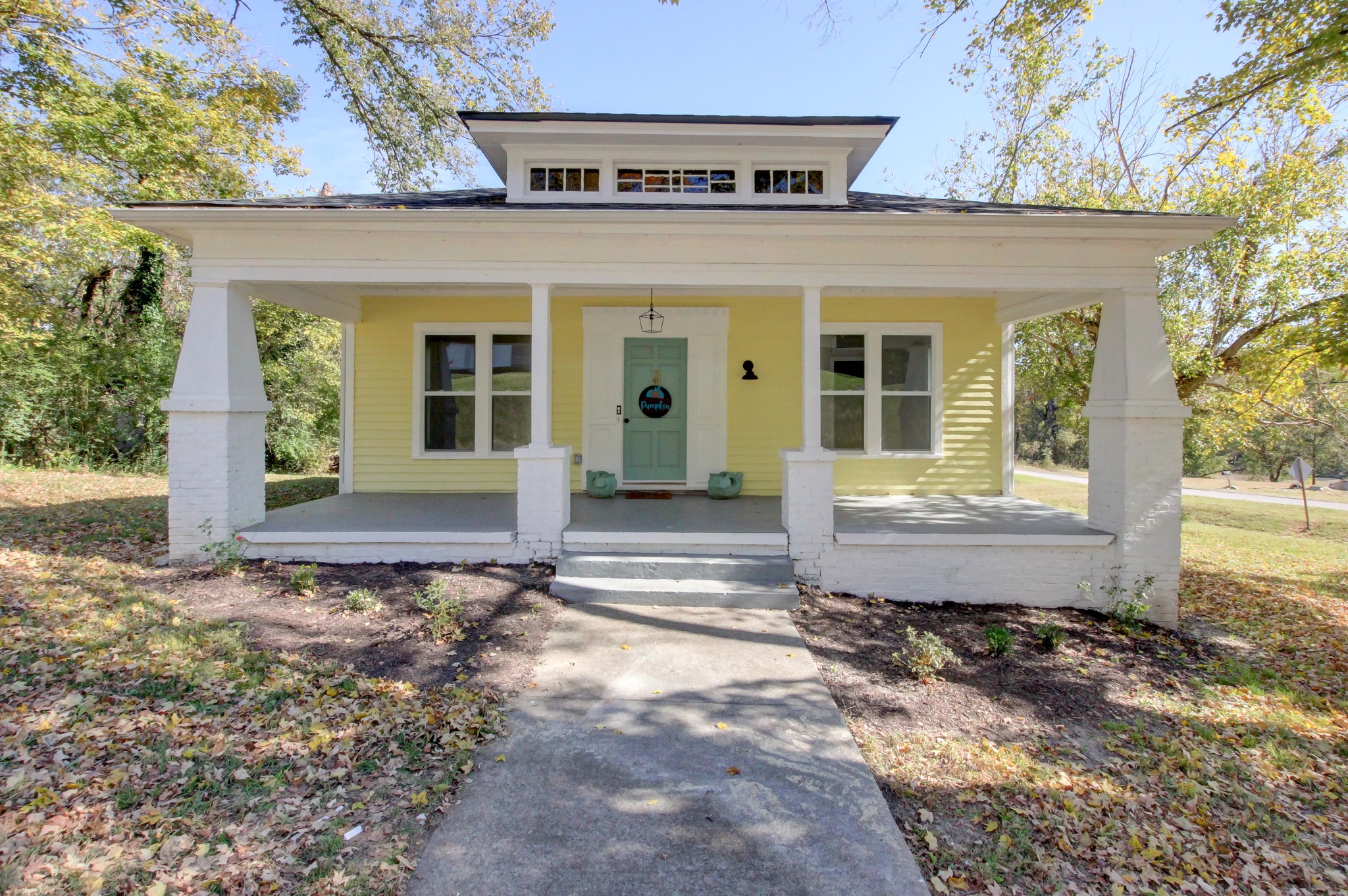 a view of a house with door of a yard