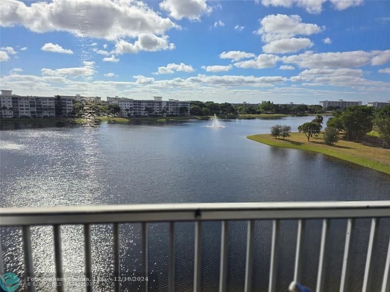 a view of lake from a balcony