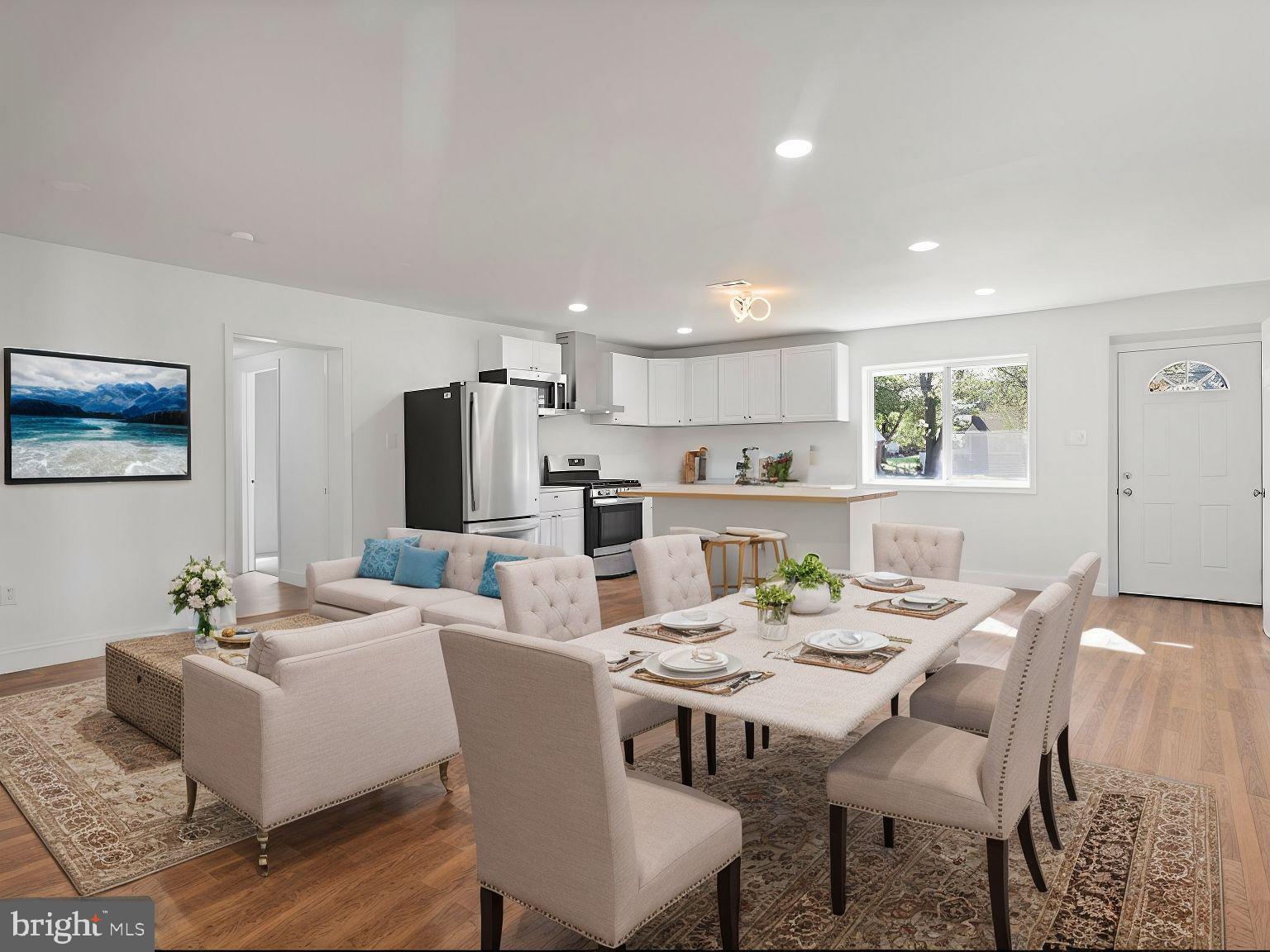 a view of a dining room with furniture