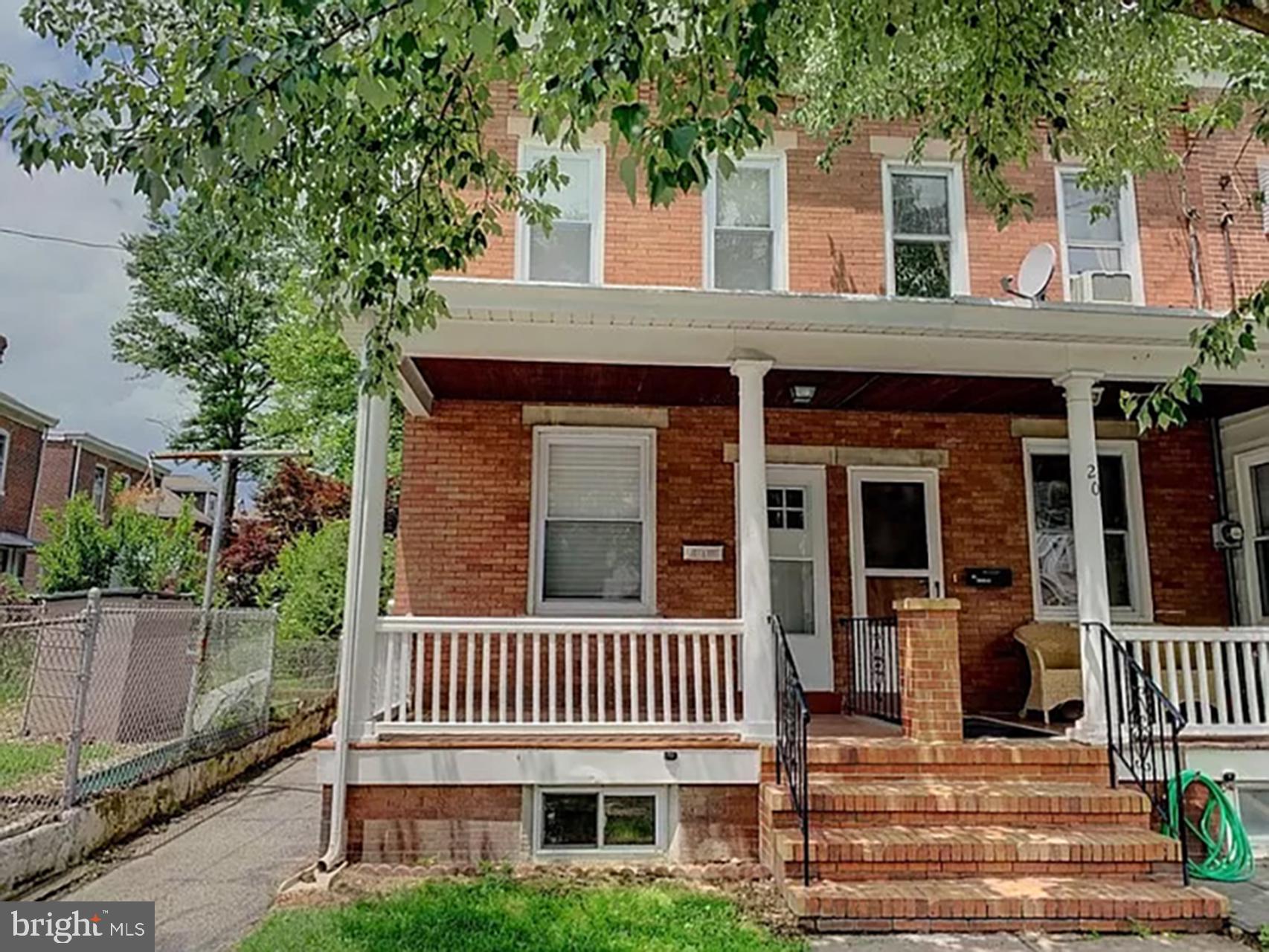 a view of a house with a porch