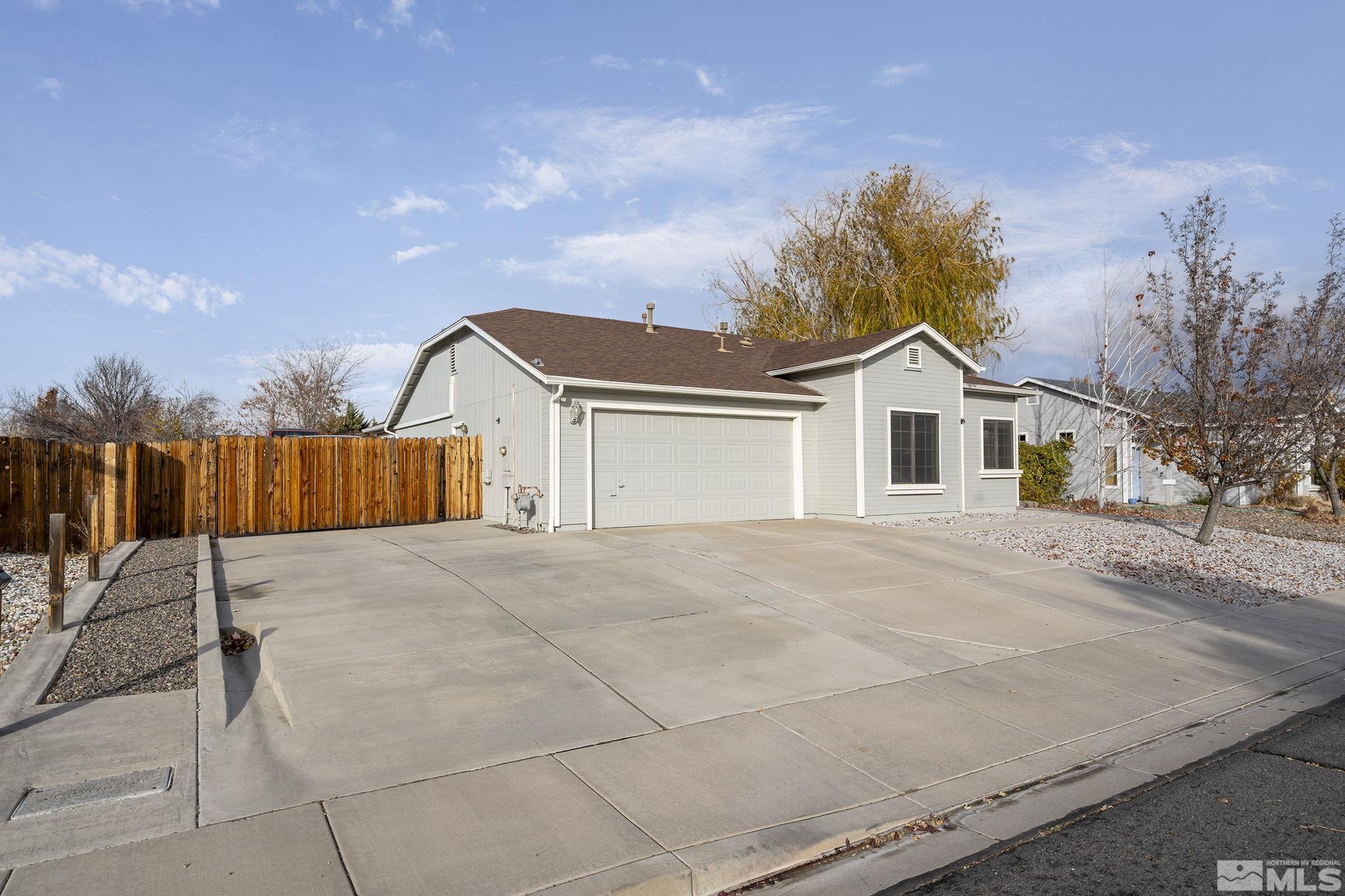 a view of backyard of house