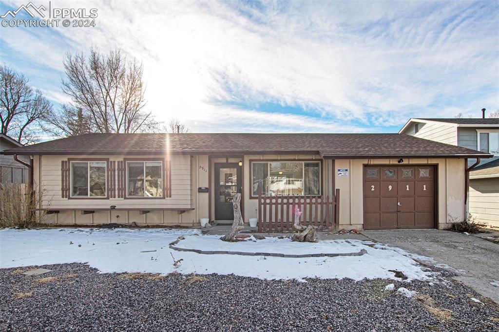 View of front of home with a garage