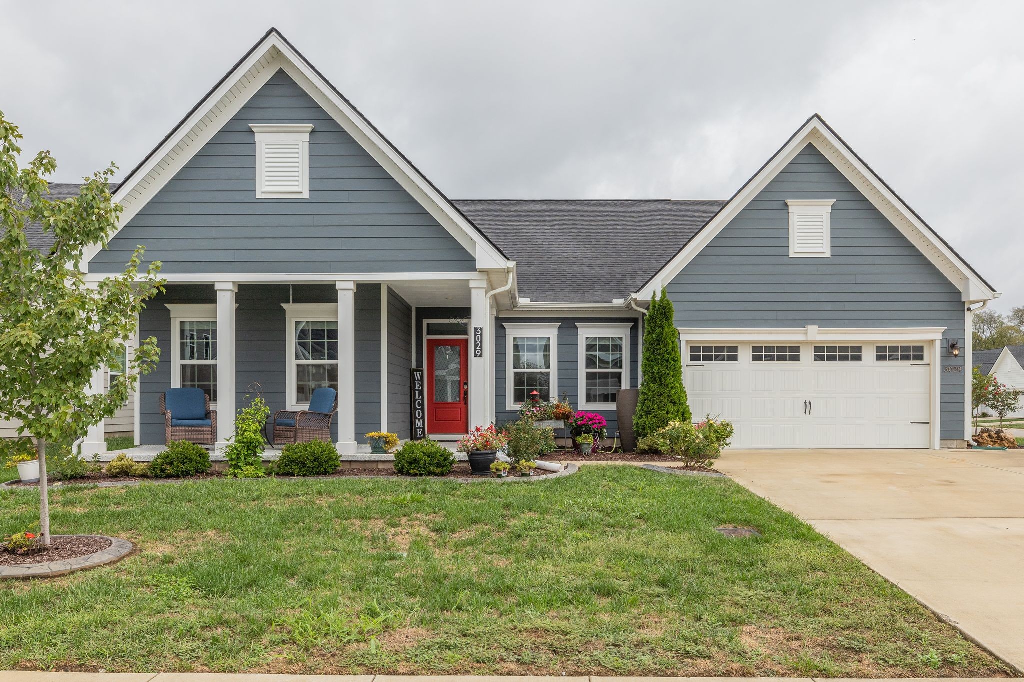 front view of a house with a yard