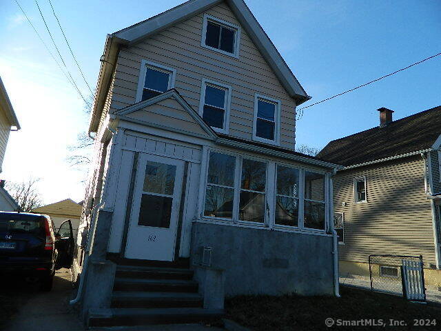 a front view of a house with a window