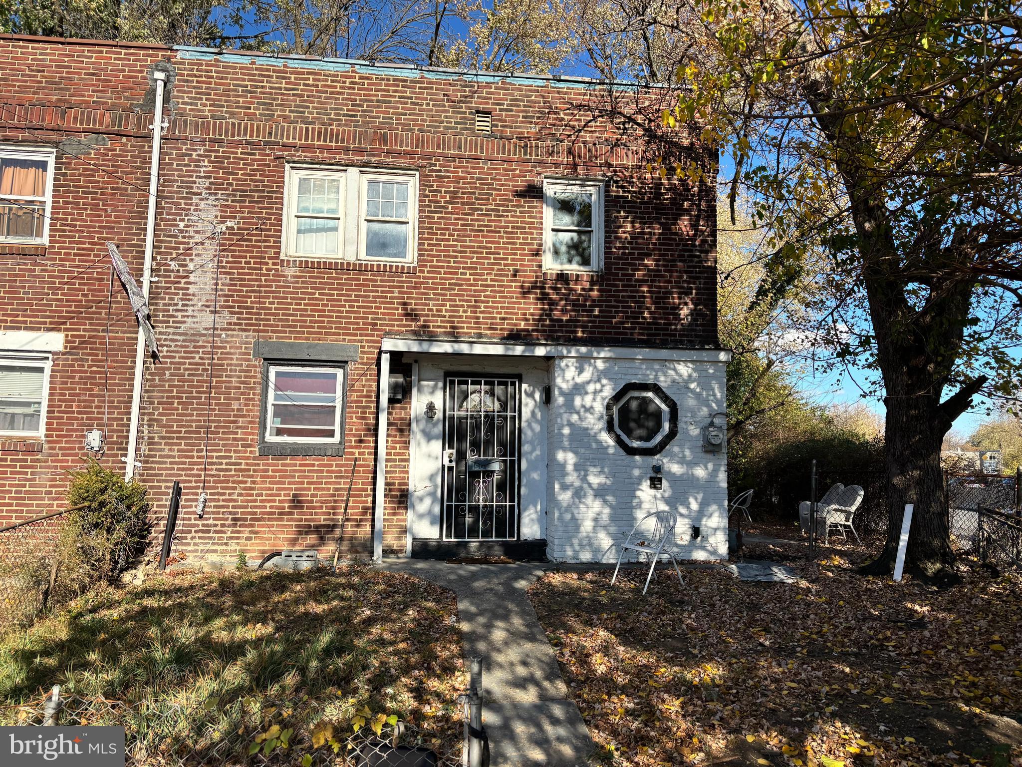 a front view of a house with yard