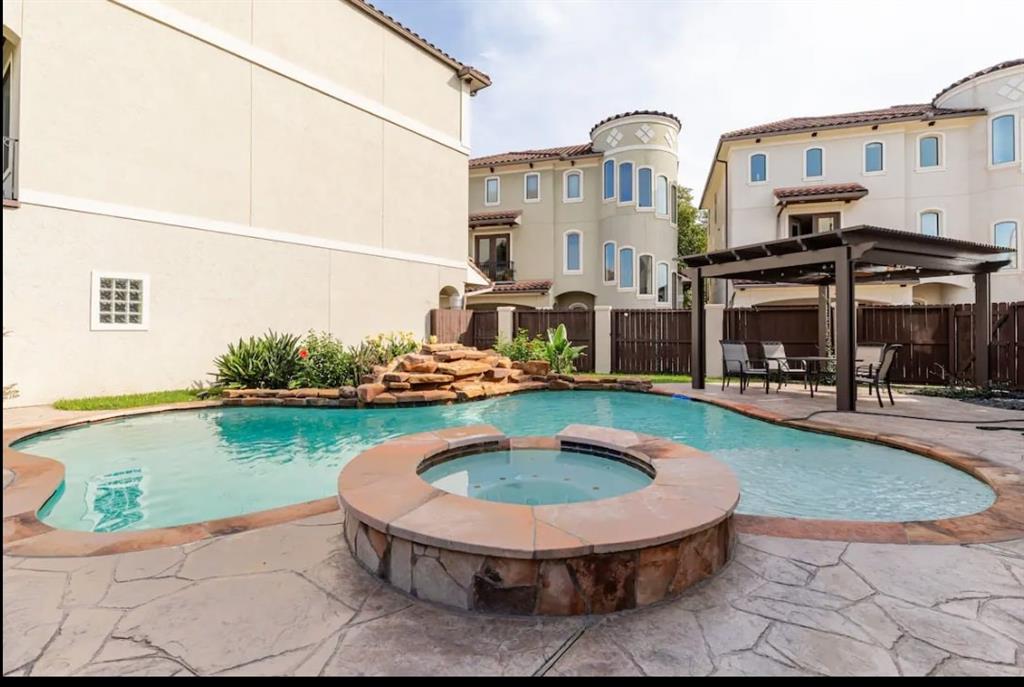 a view of a house with swimming pool