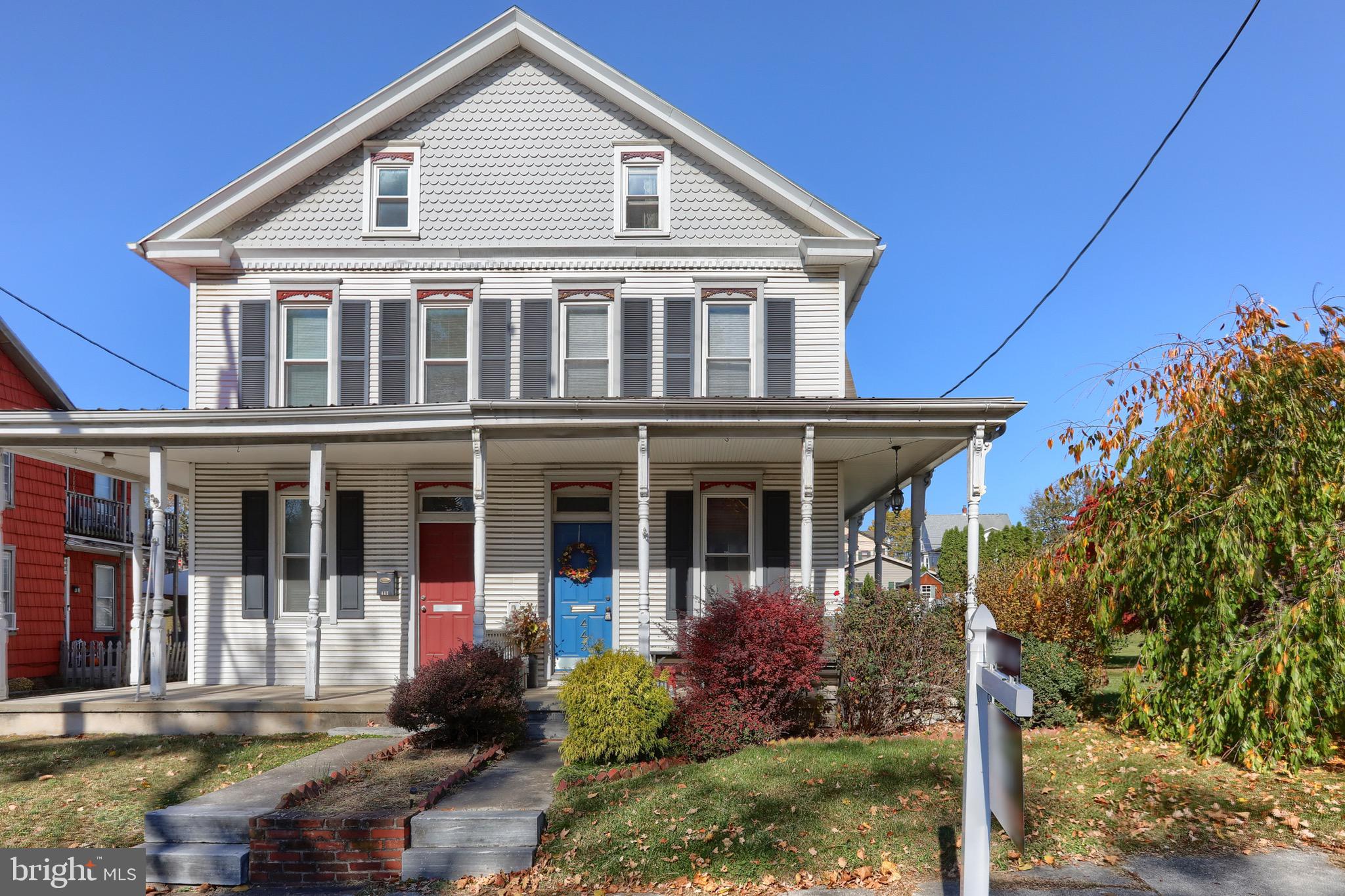 front view of a house with a small yard