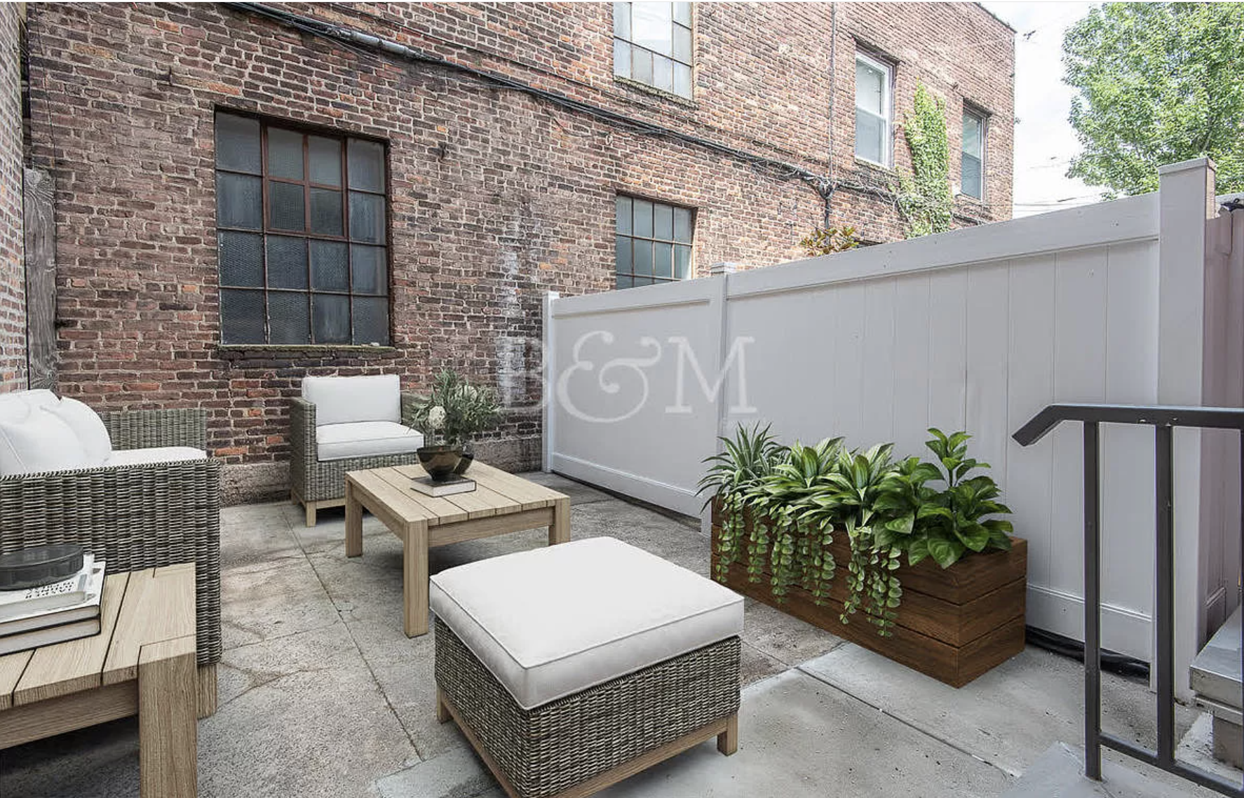 a building outdoor space with patio furniture