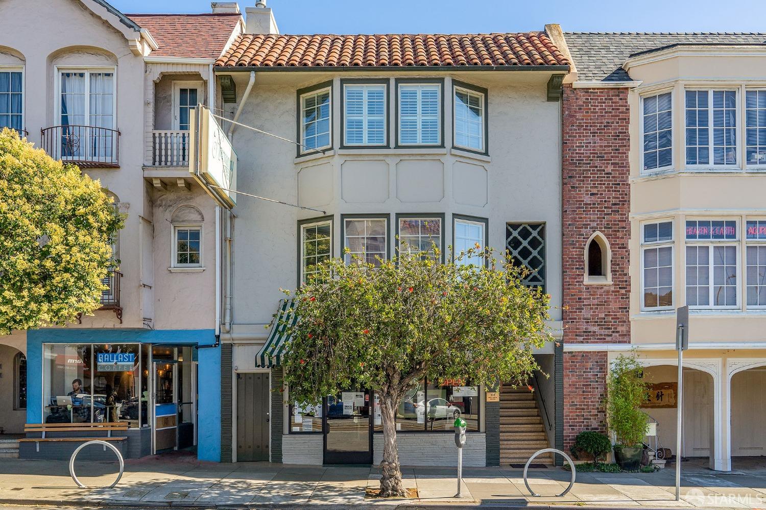 a front view of a building with street