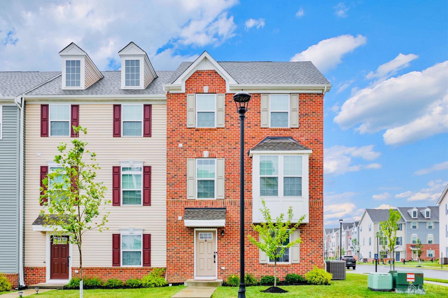 a front view of a multi story residential apartment building