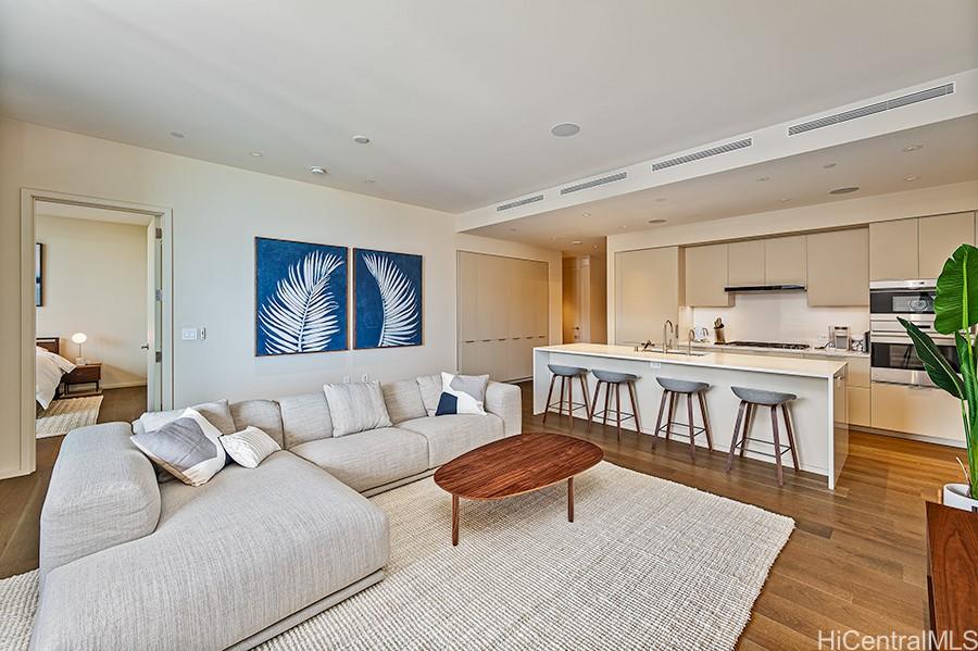 a living room with furniture and a table