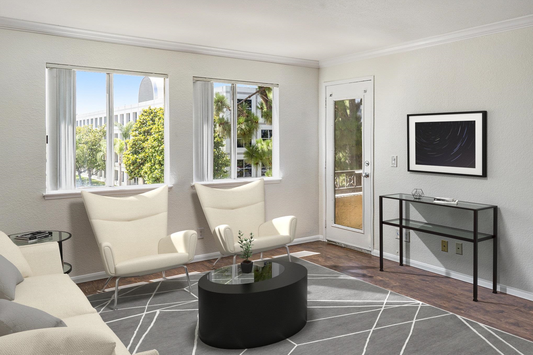 a living room with furniture and a window