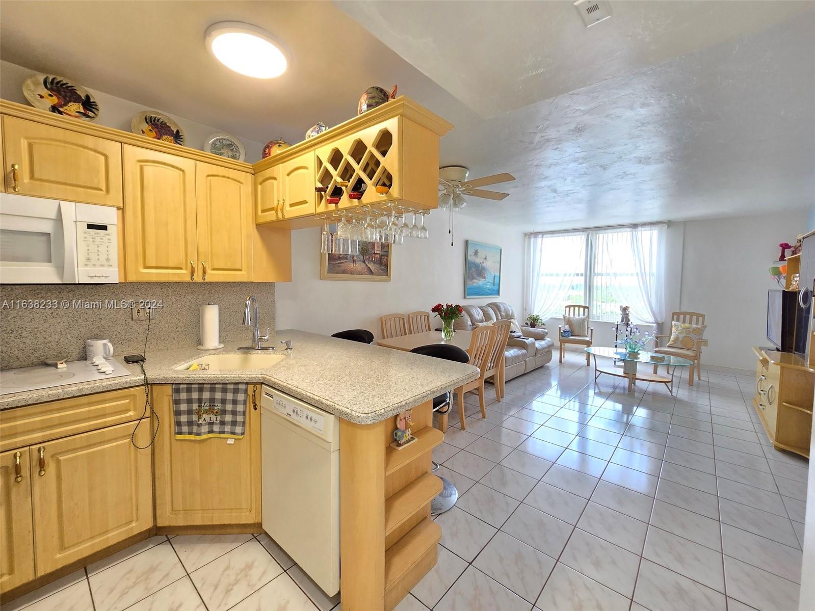 a kitchen with a cabinets and counter space