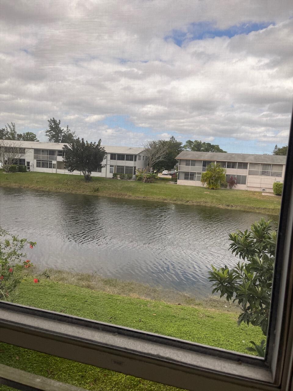 a view of a lake from a balcony