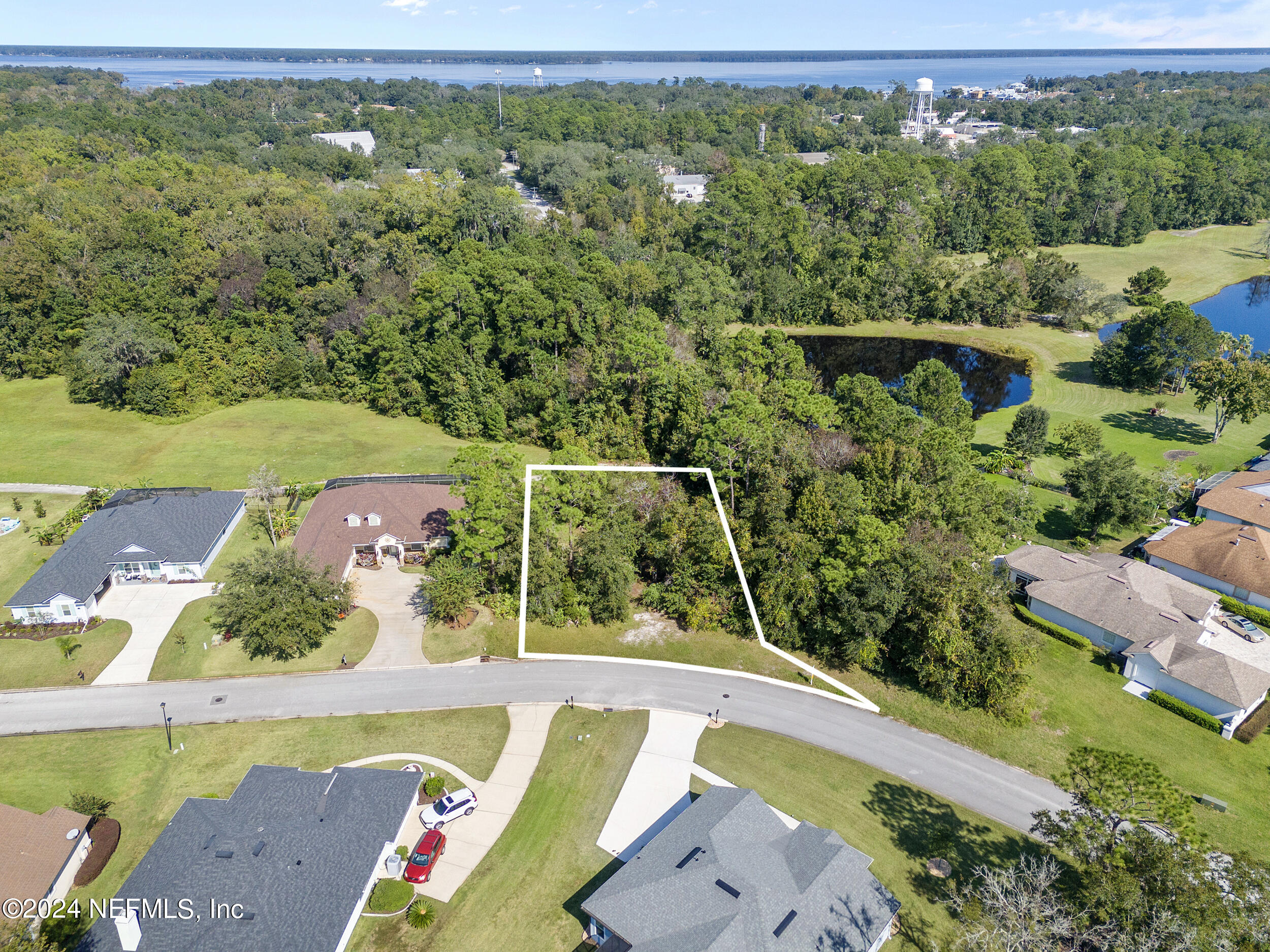 an aerial view of a house with a garden