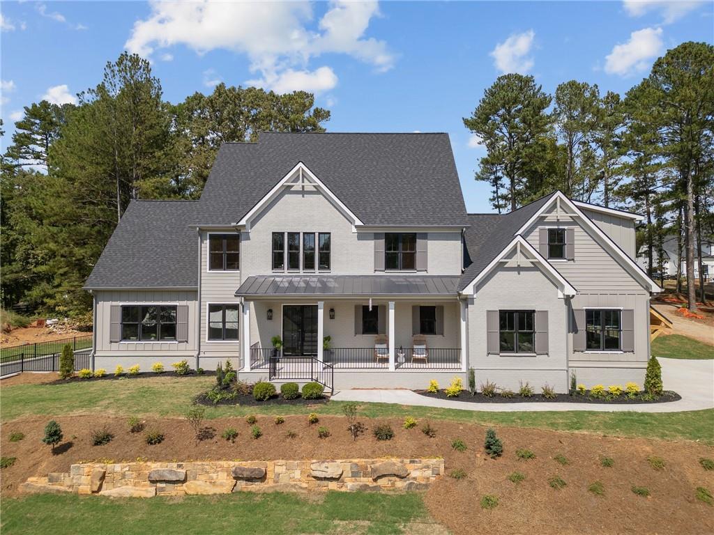 front view of a house with a yard