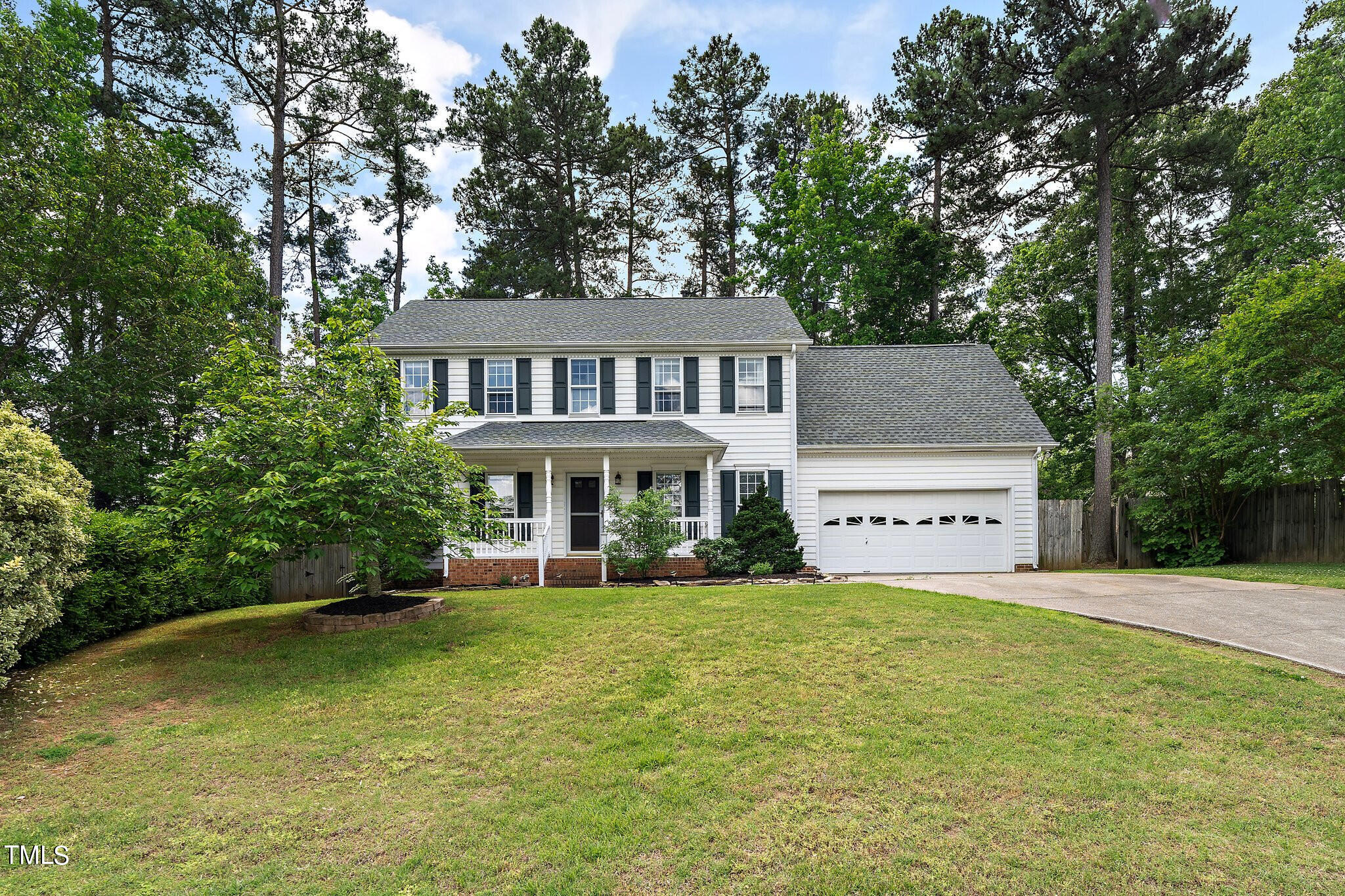 a house view with a garden space