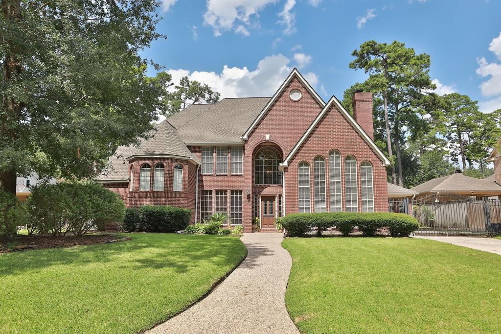 Welcome home to 6810 Napier Lane, Houston, Texas 77069 - Drive gate entrance into your carport with 2 car detached garage.