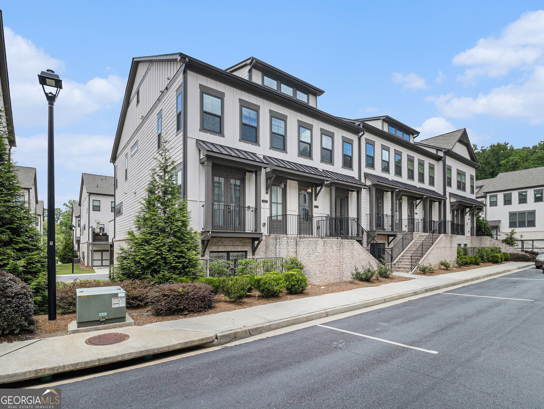 a front view of a building with street view