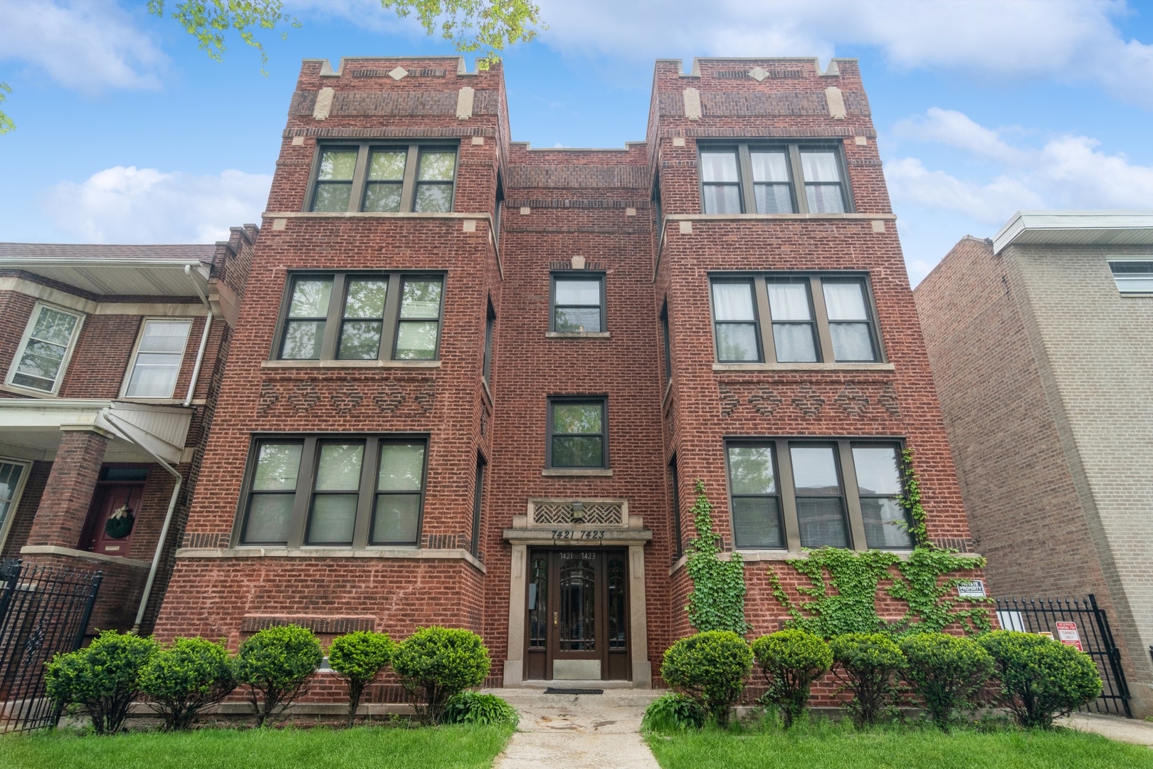 a front view of a multi story residential apartment building