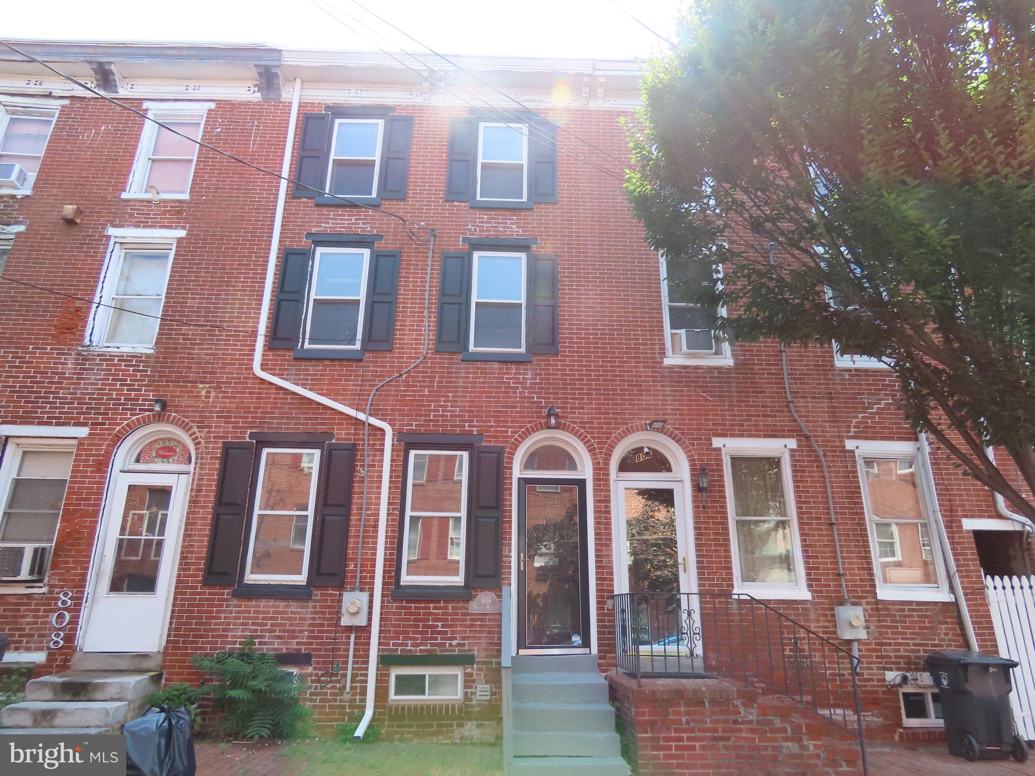 a front view of a multi story residential apartment building