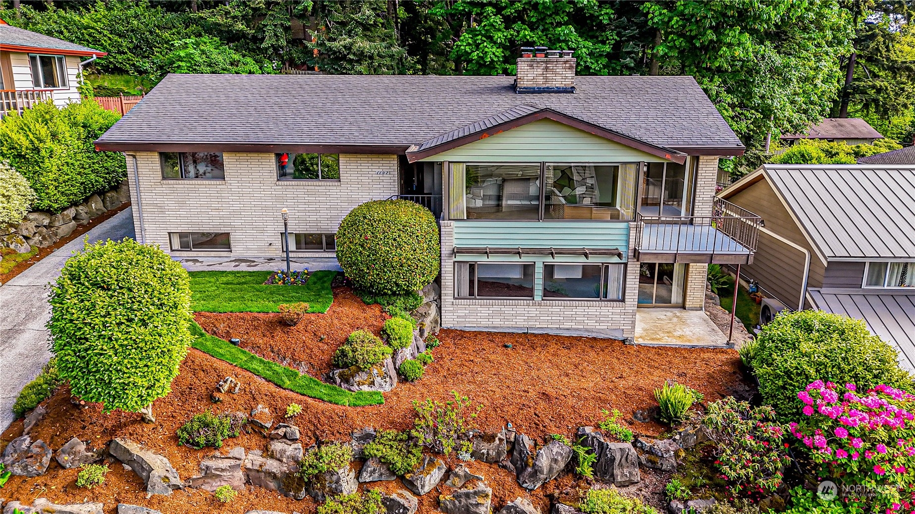 a house view with a garden space